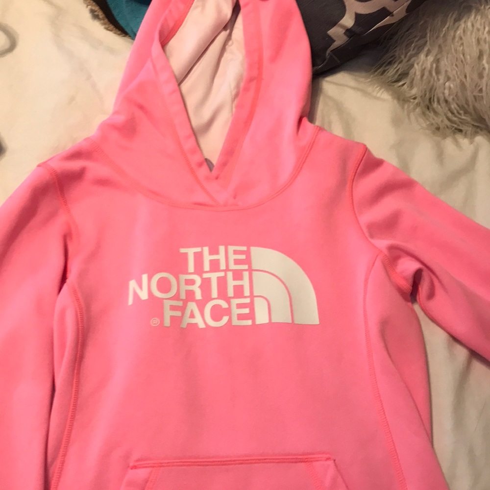 Bright pink North Face hoodie
